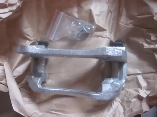 скоба суппорта! переднего левого Geely Emgrand EC7 1064001726